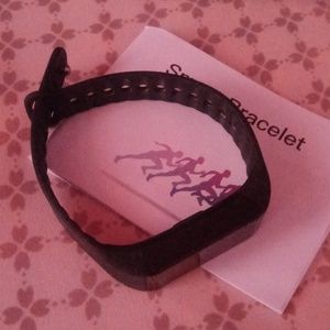 Black smart bracelet and manual